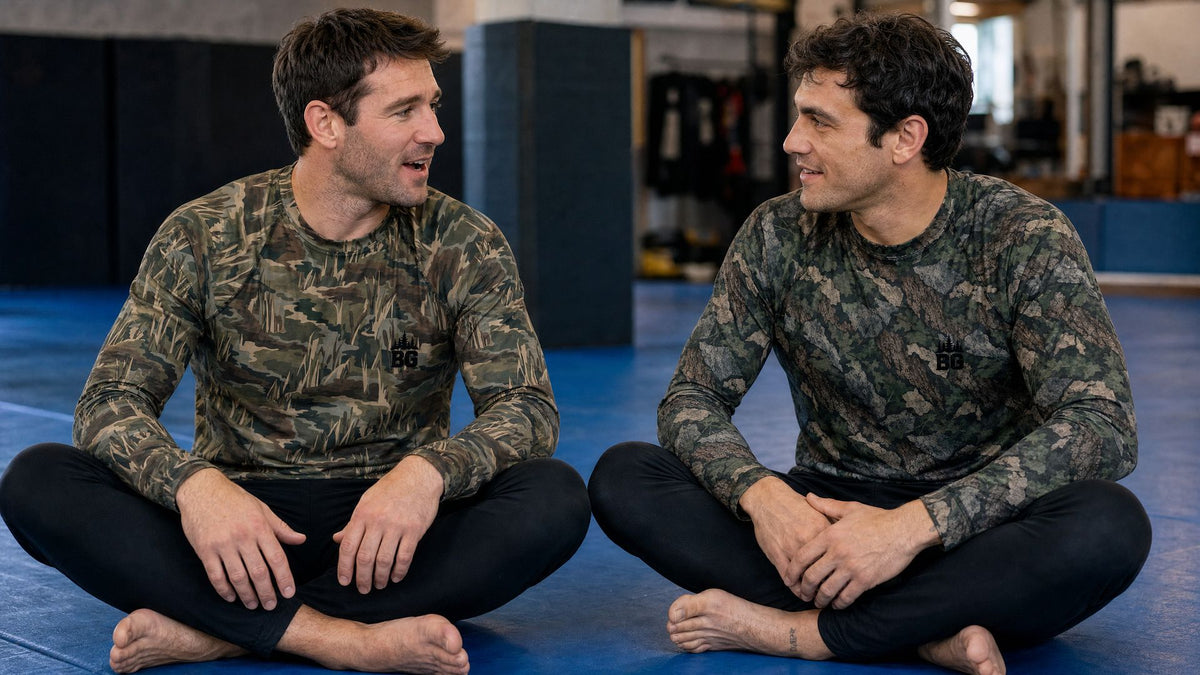 Grapplers on the mat in Brushland camo rashguards